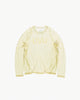 Yellow long-sleeve shirt with 'UVO' branding on a white background