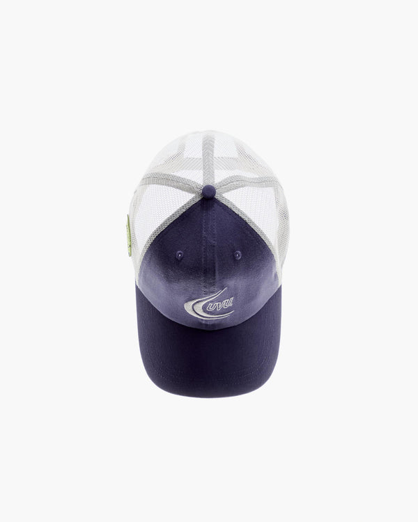 Two baseball caps, one white and one dark blue, on a white background